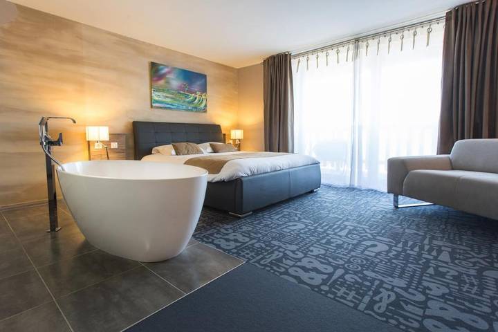 Hôtel pour 4 personnes, avec Terrasse et Jacuzzi ainsi que Sauna et Vue