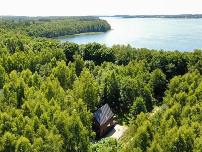 Ferienhaus für 8 Personen, mit Ausblick und Seeblick sowie Sauna und Garten