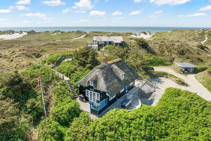 Ferienhaus für 6 Personen, mit Balkon/Terrasse und Whirlpool sowie Terrasse und Sauna in Søndervig