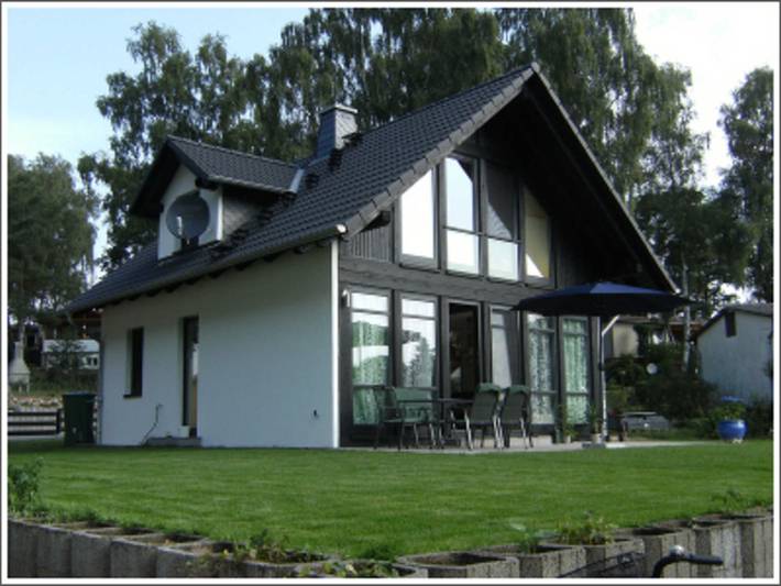 Ferienwohnung für 6 Personen, mit Terrasse und Garten sowie Sauna