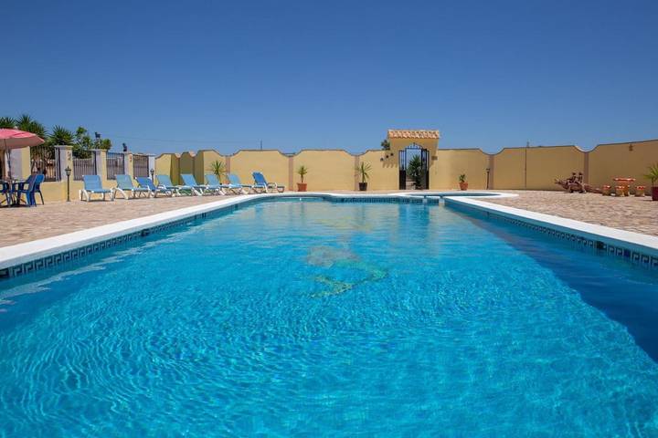 Casa de vacaciones para 9 personas, con Balcón y Terraza además de Jardín y Piscina para niños en Turre