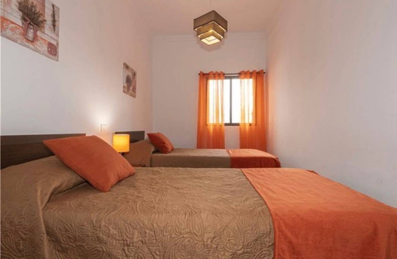 Casa Vacacional 'Vivienda 1' con Vista a la Montaña, Piscina Compartida y Terraza Privada in San Bartolomé de Tirajana, Gran Canaria Sur