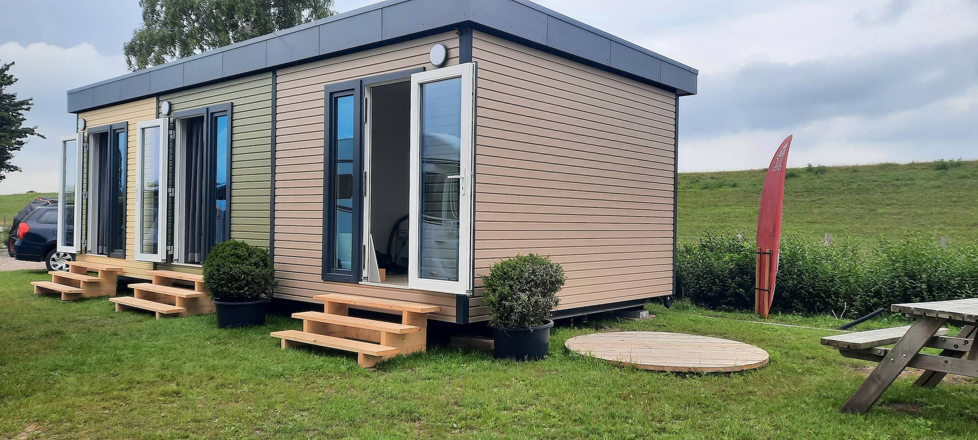 Gästehaus 'Surfbrett 1 – Zimmer mit Deichblick' mit Gemeinschaftsgarten und Wlan in Dahme, Ostholstein