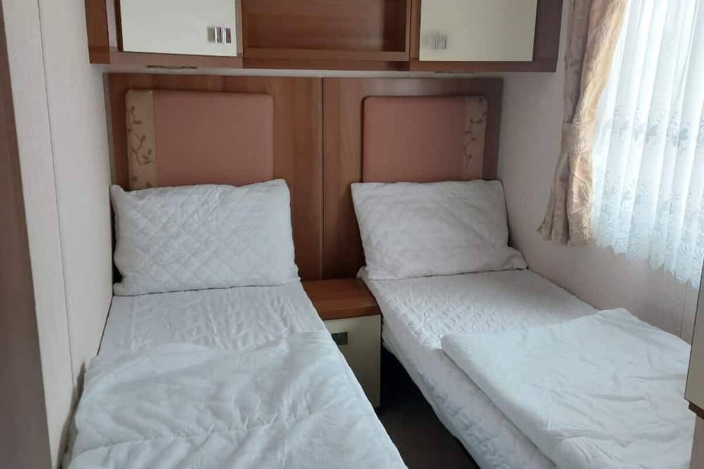 Cosy caravan with side decking at Felixstowe Beach Holiday Park in Felixstowe, Suffolk
