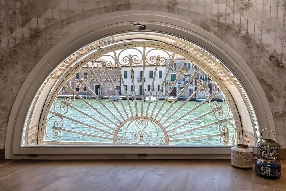 Apartamento entero, Suite Rubino con discreta vista al canal y chimenea in Murano, Provincia de Venezia