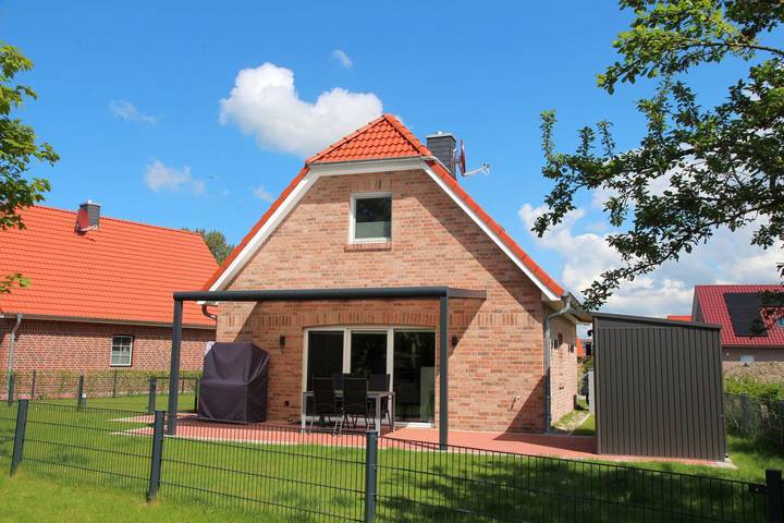 Ferienhaus für 4 Personen, mit Terrasse und Garten sowie Ausblick in Eilsum