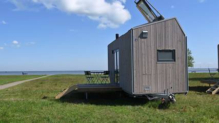 Ferienhaus mit Meerblick für 4 Personen, mit Ausblick und Terrasse sowie Sauna in Schillig