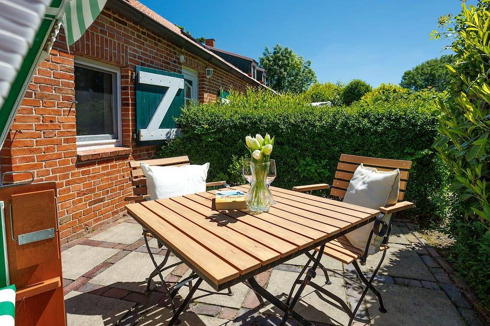 Ganze Wohnung, Romantisches Apartment Melkkammer: 45qm im Grünen, Terrasse & Garten 2 Personen in Altharlingersiel, Neuharlingersiel