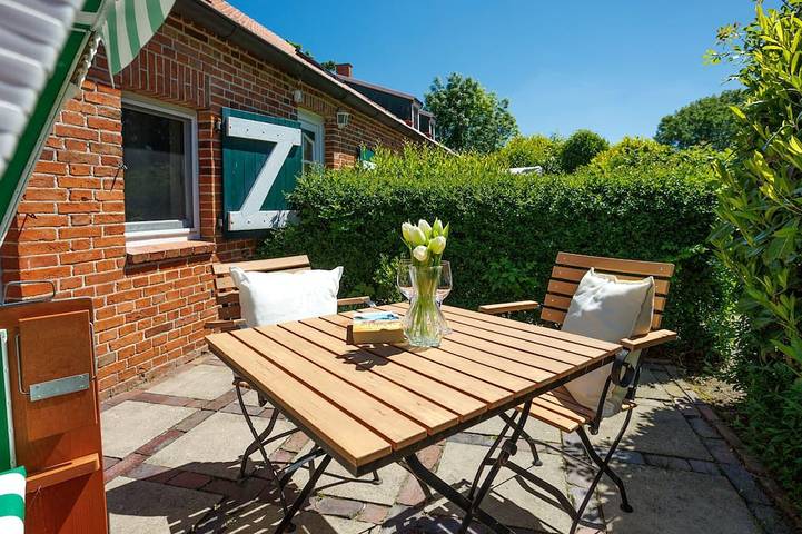 Ferienwohnung für 2 Personen, mit Terrasse und Garten in Altharlingersiel