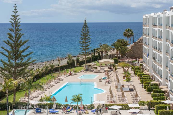 Apartamento entero, Apartamento 'Riviera Peace' cerca de la playa, con piscina compartida y Wi-Fi in Playa del Cura, Mogán