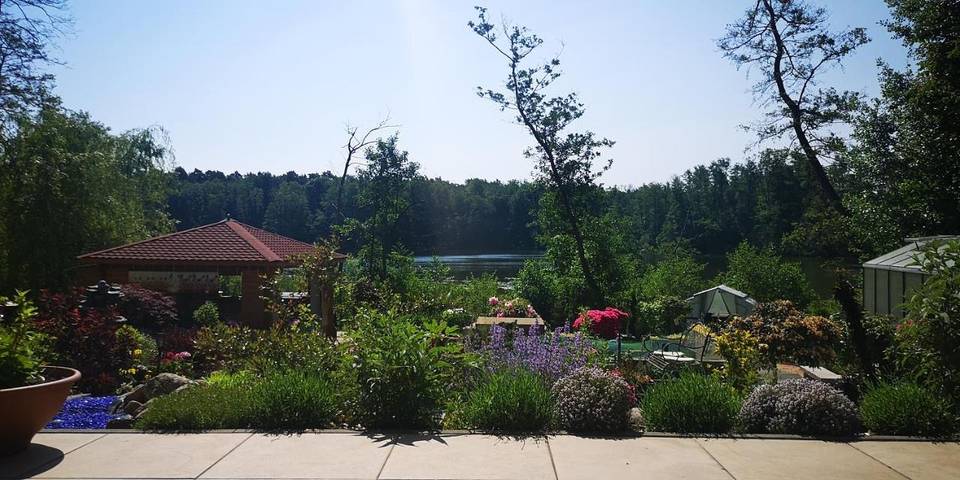 Ferienwohnung für 4 Personen, mit Terrasse und Garten sowie Ausblick und Seeblick