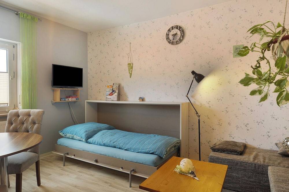 Entire apartment, Apartment 'Haus Ute' with Private Terrace, Shared Garden and Wi-Fi in Schotten, Vogelsberg Region