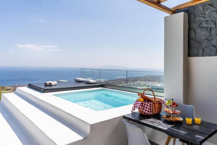 Casa de vacaciones para 2 personas, con vistas además de piscina y jardín en Imerovigli