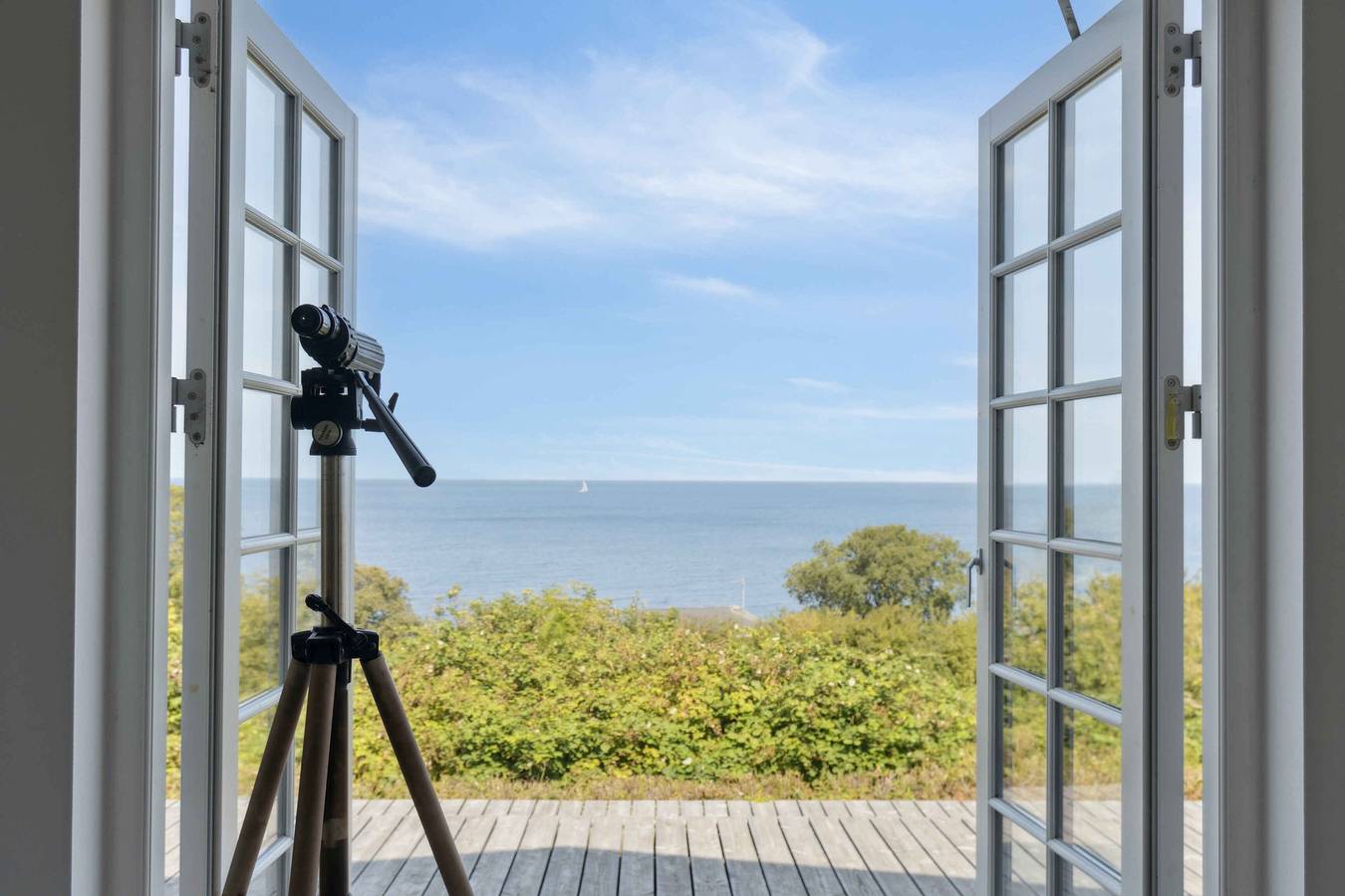 Vue mer magique – de la terrasse à l’horizon in Listed, Svaneke