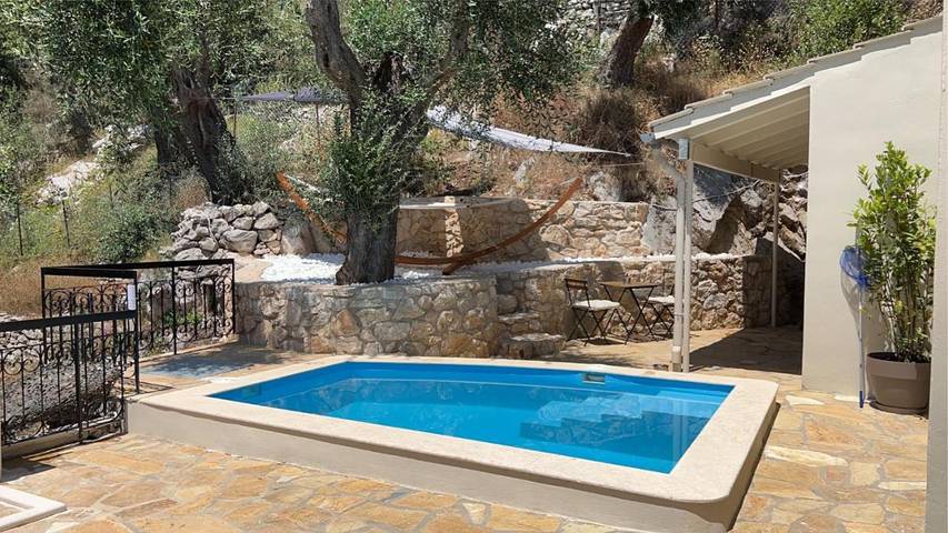 Appartement de vacances pour 2 personnes, avec terrasse ainsi que vue et piscine