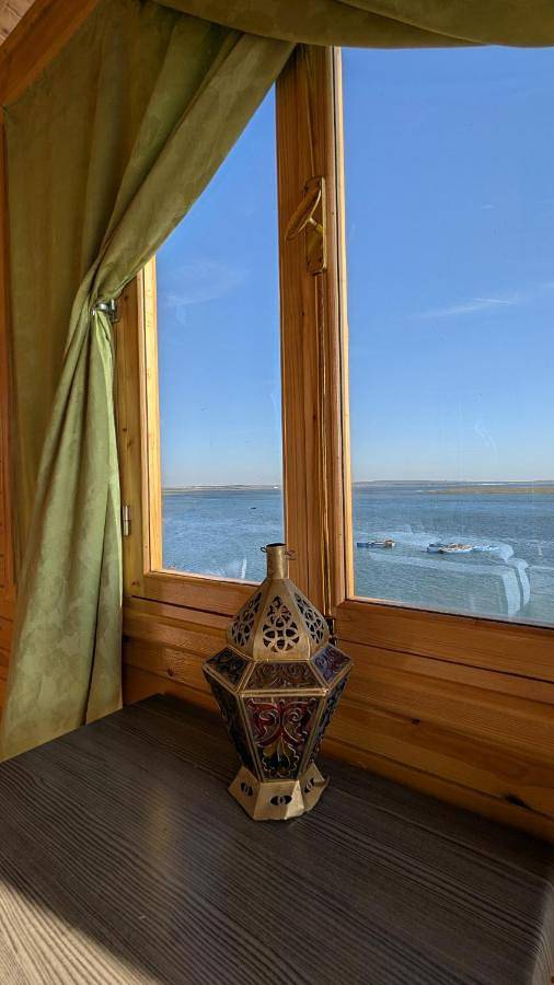 Location de vacances pour 3 personnes, avec vue sur le lac et balcon ainsi que jardin et vue à Moulay Bousselham - 3