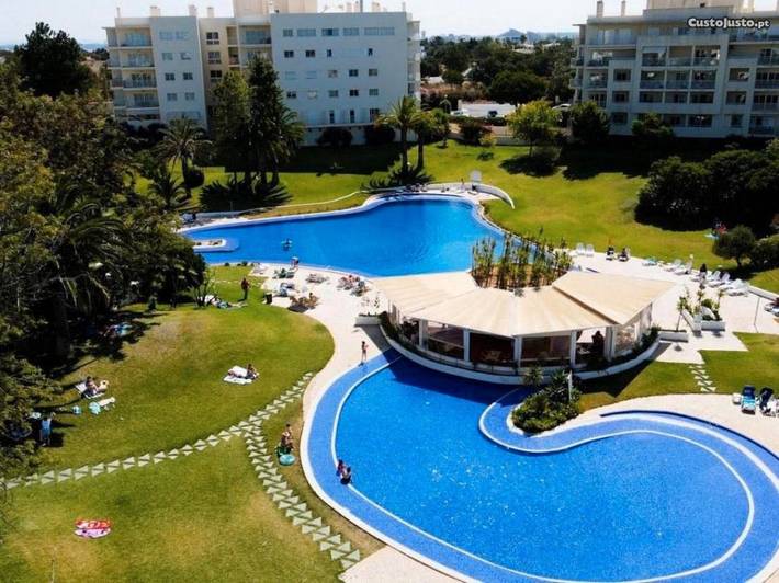Casa de férias para 7 pessoas, com Varanda e Jardim e ainda Piscina infantil and Vista para o lago em Alvor