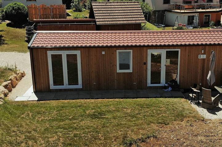 Ferienhaus für 4 Personen, mit Balkon und Garten in Birgland