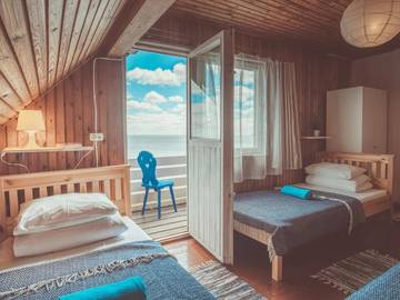 Maison d’hôte pour 3 personnes, avec terrasse ainsi que jardin et vue, animaux acceptés à Nida