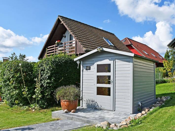 Ferienwohnung für 4 Personen, mit Sauna und Terrasse sowie Garten, mit Haustier in Lancken-Granitz