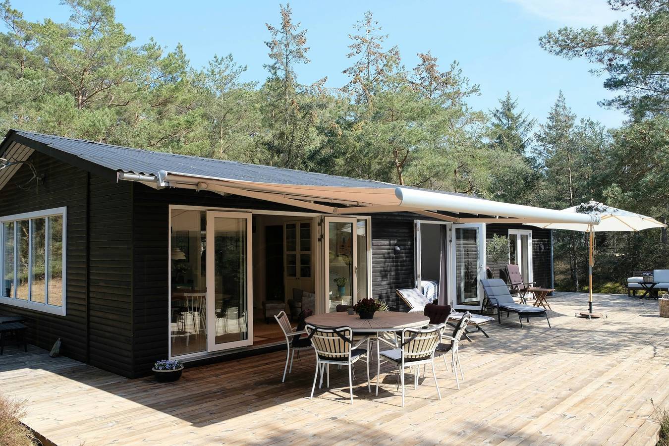 Ferienhaus mit freiem Blick auf den Wald in der Nähe von Nexø in Sommerodden, Dueodde