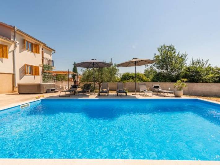 Ferienhaus für 8 Personen, mit Balkon