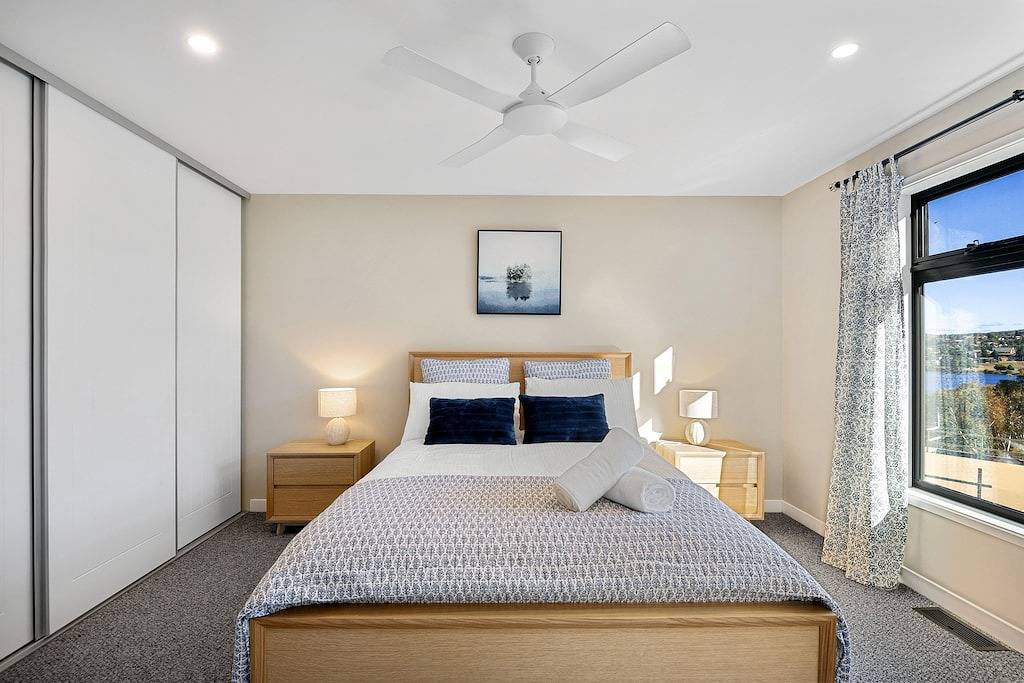 Mountain bike in & out, off Rainbow drive, on lake in East Jindabyne, New South Wales