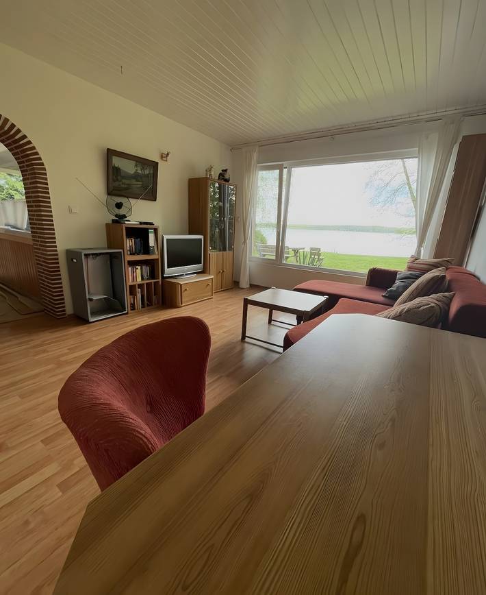 Ferienhaus 'Sommerhaus Seeblick' mit Seeblick, privater Terrasse & Gemeinschaftsgarten in Am Mellensee, Dahme-Seengebiet