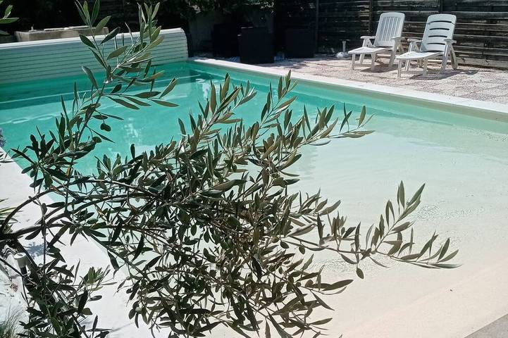 Appartement de vacances pour 4 personnes, avec jardin ainsi que terrasse et piscine