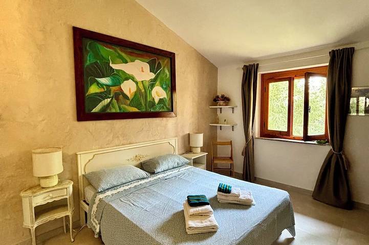 Location de vacances pour 4 personnes, avec jardin à Cala Liberotto - 2
