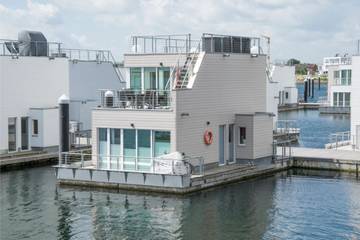 Ferienhaus mit Meerblick für 5 Personen, mit Sauna und Ausblick sowie Balkon in Olpenitz