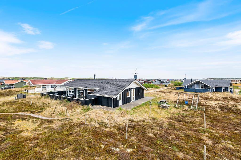 Helles Ferienhaus mit Wintergarten, Sauna und Whirlpool in Hvide Sande, Holmsland Klit