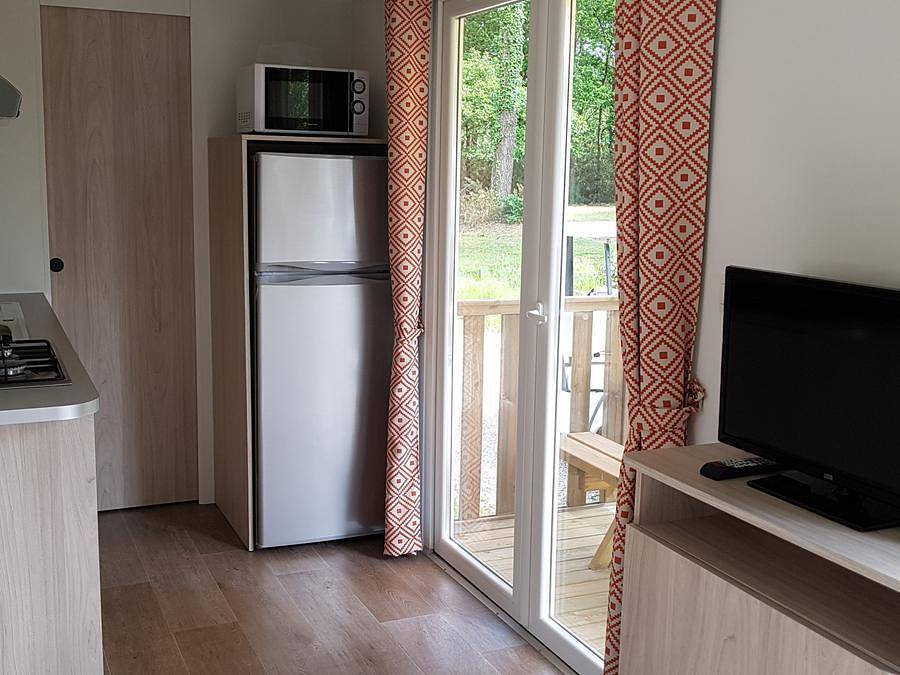Camping Le Saint Laurent - Mobilhome 4 personas - Mobil-home confort - 29m² - 2 habitaciones - terraza semi-cubierta in Golf Saint-Laurent, Ploemel