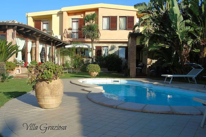 Villa für 12 Personen, mit Balkon und Garten