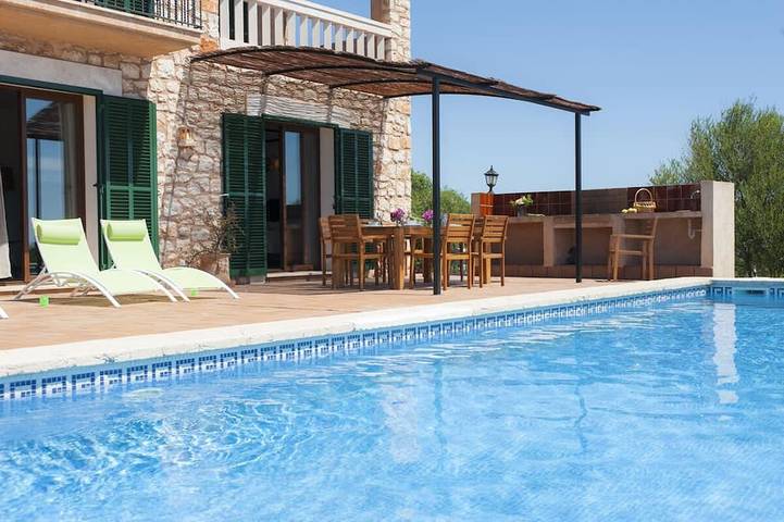 Ferienhaus für 8 Personen, mit Balkon und Garten in S'Alqueria Blanca