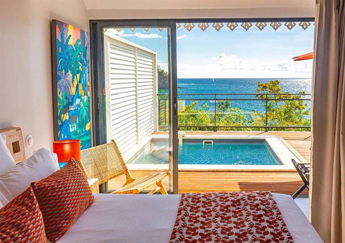Hôtel pour 2 personnes, avec jardin et piscine ainsi que vue et sauna à Bouillante