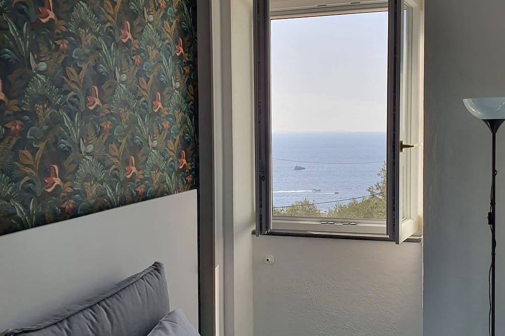 Blu Home gorgeous chalet nestled in a lemon grove overlooking Capri in Massa Lubrense, Naples Province
