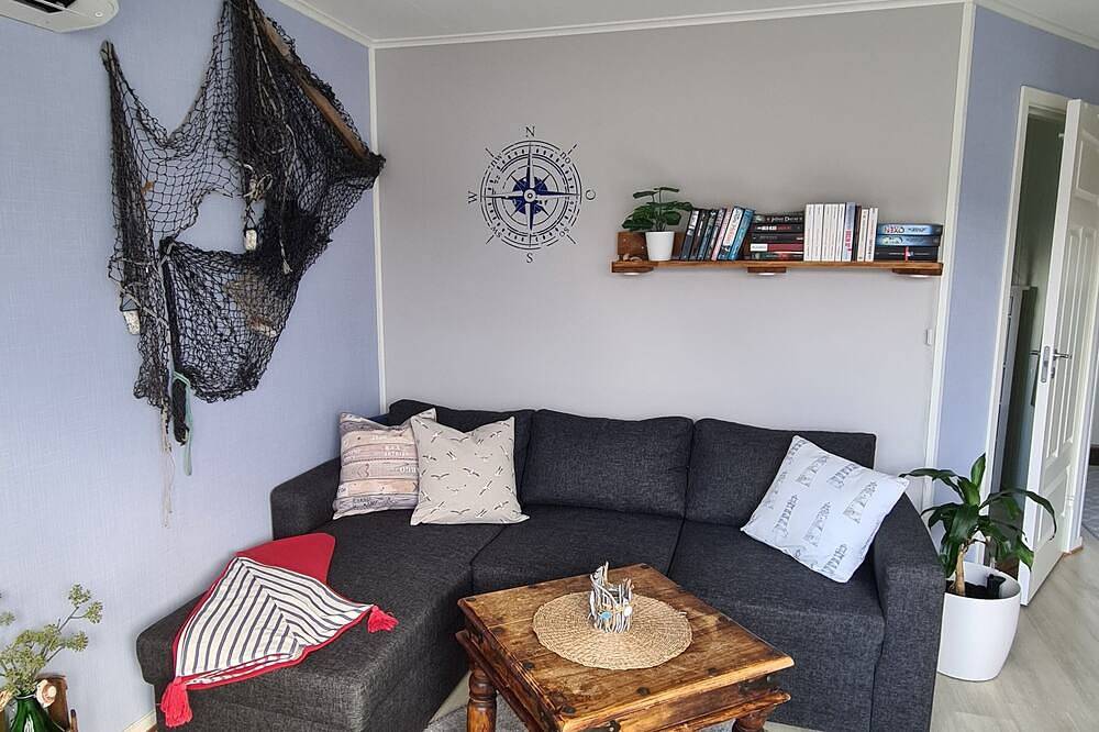 Ganze Wohnung, Gemütliche Ferienwohnung in Mittelnorwegen mit Bergen und Meer vor der Tür in Flatanger