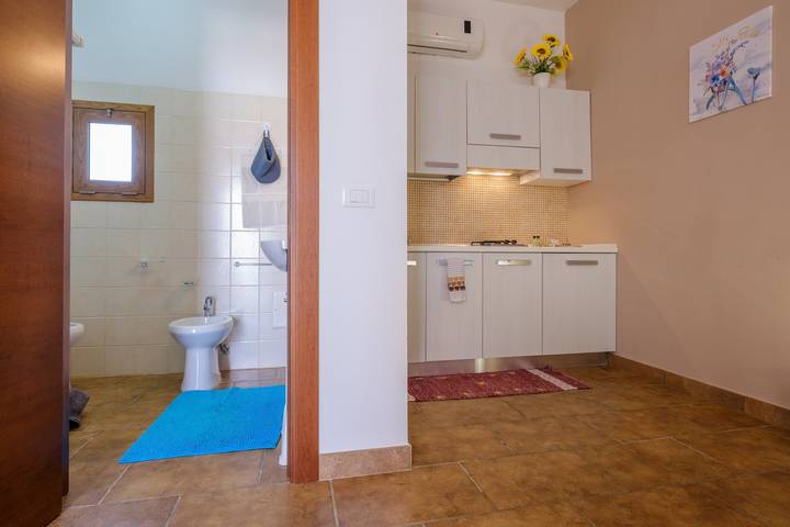 Monolocale intero, Appartamento 'Mamba House 3' con terrazza privata, giardino in comune e aria condizionata in Borgagne, Melendugno