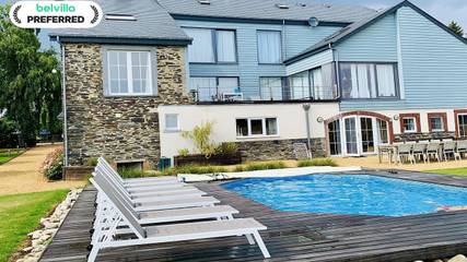 Location de vacances pour 12 personnes, avec terrasse et piscine ainsi que sauna et jardin à Houffalize