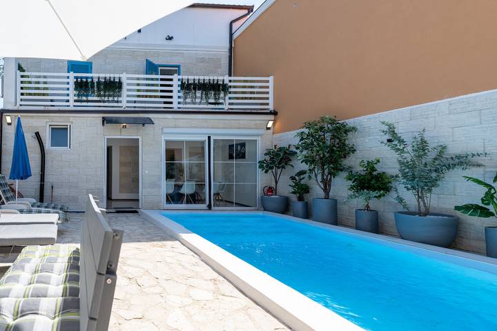 Ferienhaus für 8 Personen, mit Garten und Balkon
