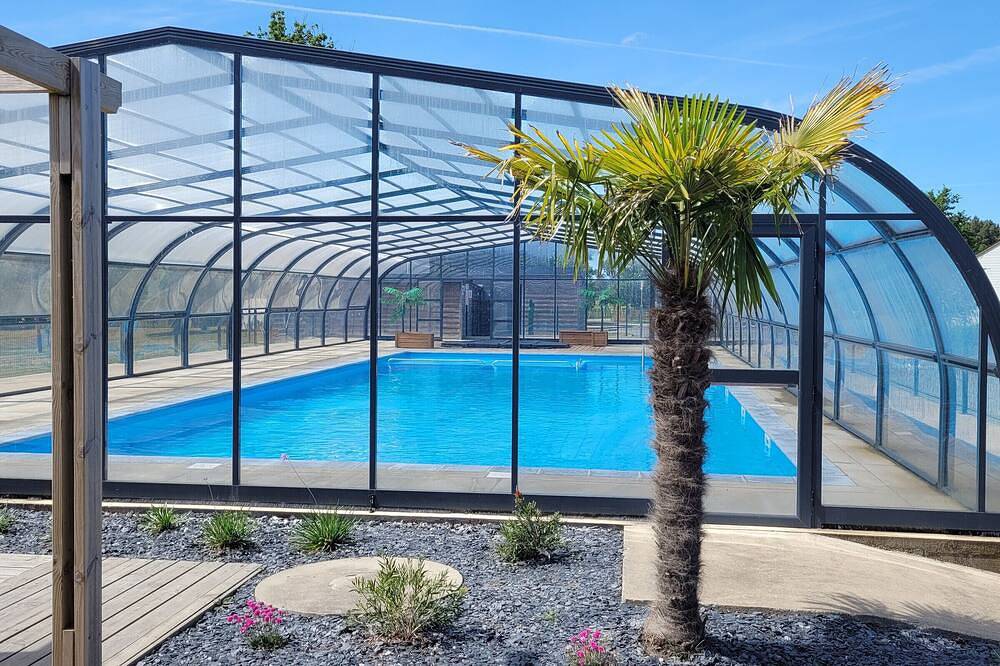 Chalet 3 hab. con piscina climatizada, cerca del Golfo de Morbihan, ideal para vacaciones naturales in Marzan, Côte des Mégalithes