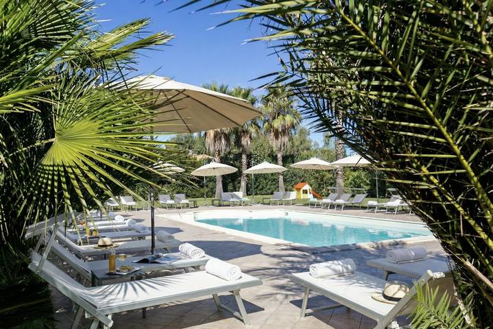 Villa con piscina per 12 persone, con Balcone/Terrazza e Giardino nonché Piscina ad Alghero