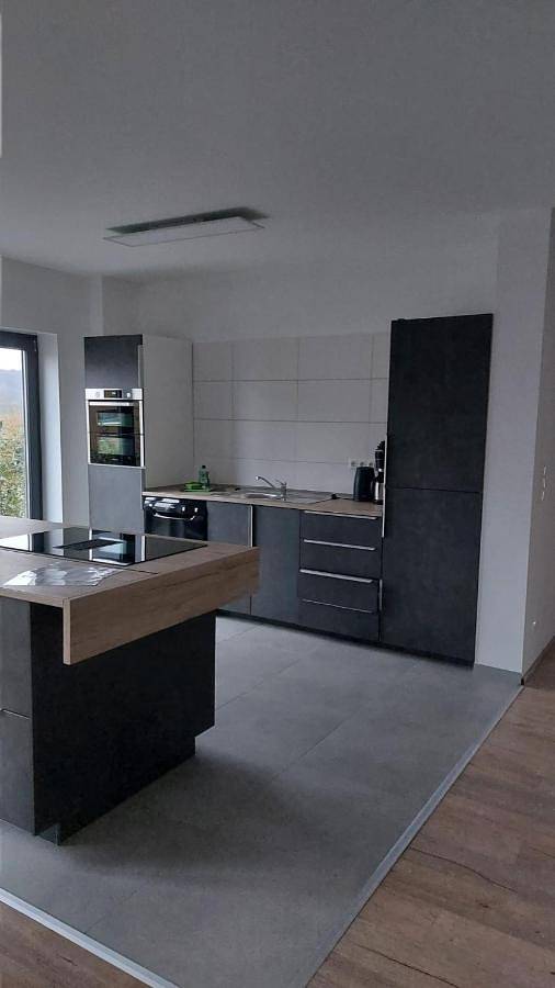 Ferienwohnung für 4 Personen, mit Terrasse und Garten sowie Seeblick und Ausblick im Westerwald