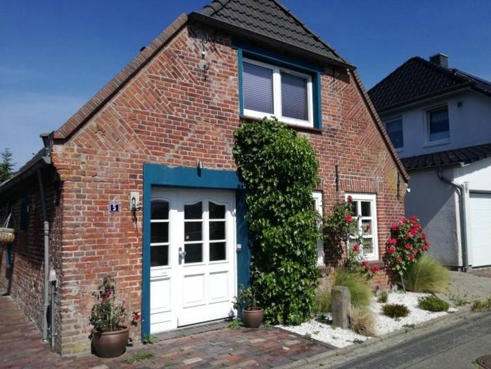 Ferienwohnung für 3 Personen, mit Balkon und Garten in Burhave