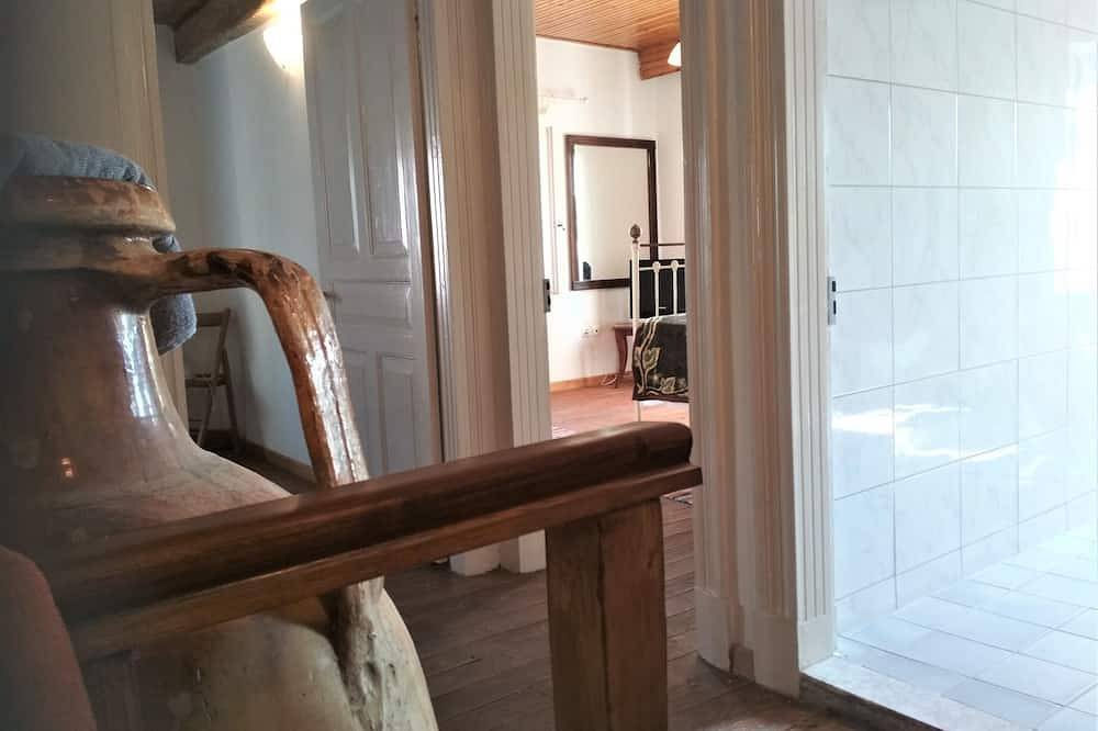 La maison de Maria est une maison traditionnelle rénovée classique. in Corfou
