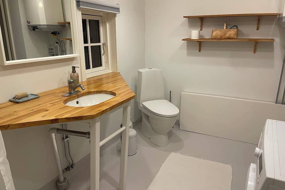 Nice farm apartment with terrace and garden right next to forest and river. in Kronoberg