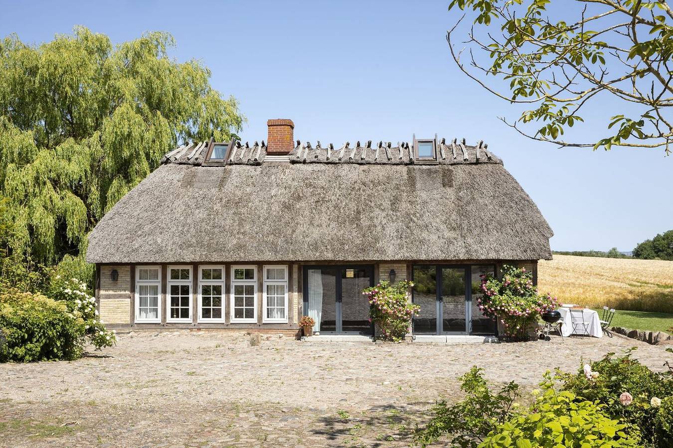 Urgemütliche Reetdachkate mit großem Kamin und Sauna in Geltinger Birk, Pommerby