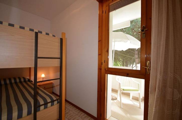 Apartamento entero, Luminosa y moderna casa de vacaciones con piscina compartida in Bibione, San Michele al Tagliamento