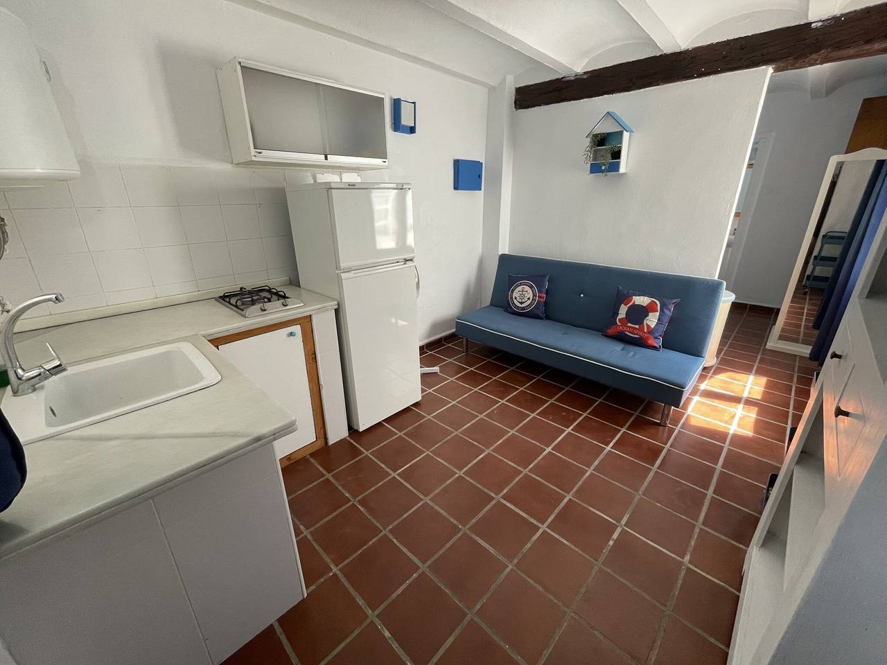 Casa con terrazza e accesso diretto a spiaggia semiprivata in Oliva, Costa Blanca